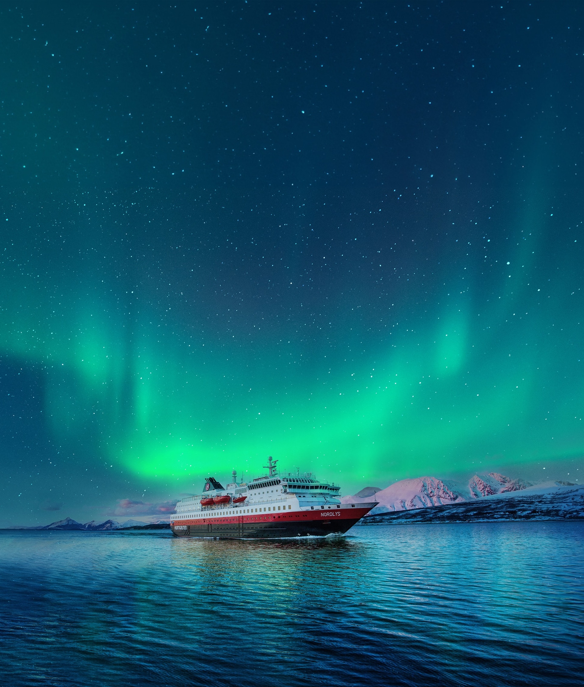 The Hurtigruten coastal ship under the northern lights
