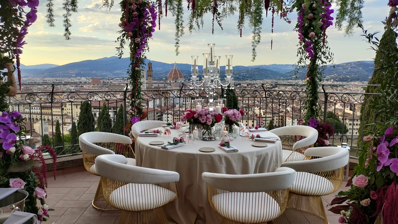The terrace of La Leggenda dei Frati set for dinner, the Duomo of Florence in the view
