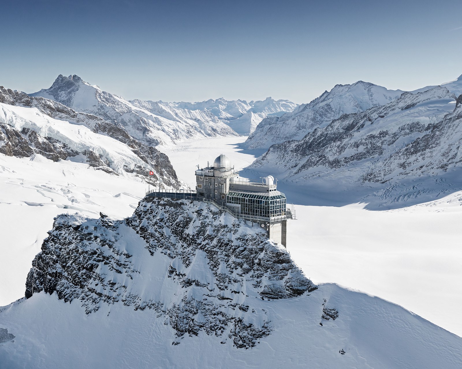 The Sphinx observatory on its ridge at Jungfraujoch, the Aletsch Glacier behind
